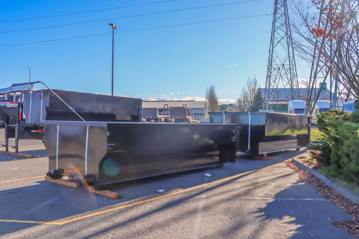 Roll-off dumpster ready for waste disposal at job site for 2 Yard Dumpster Rental in Erwin